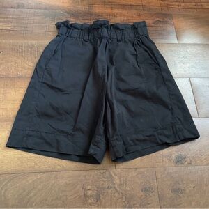 Black high-waisted Everlane ruffled shorts